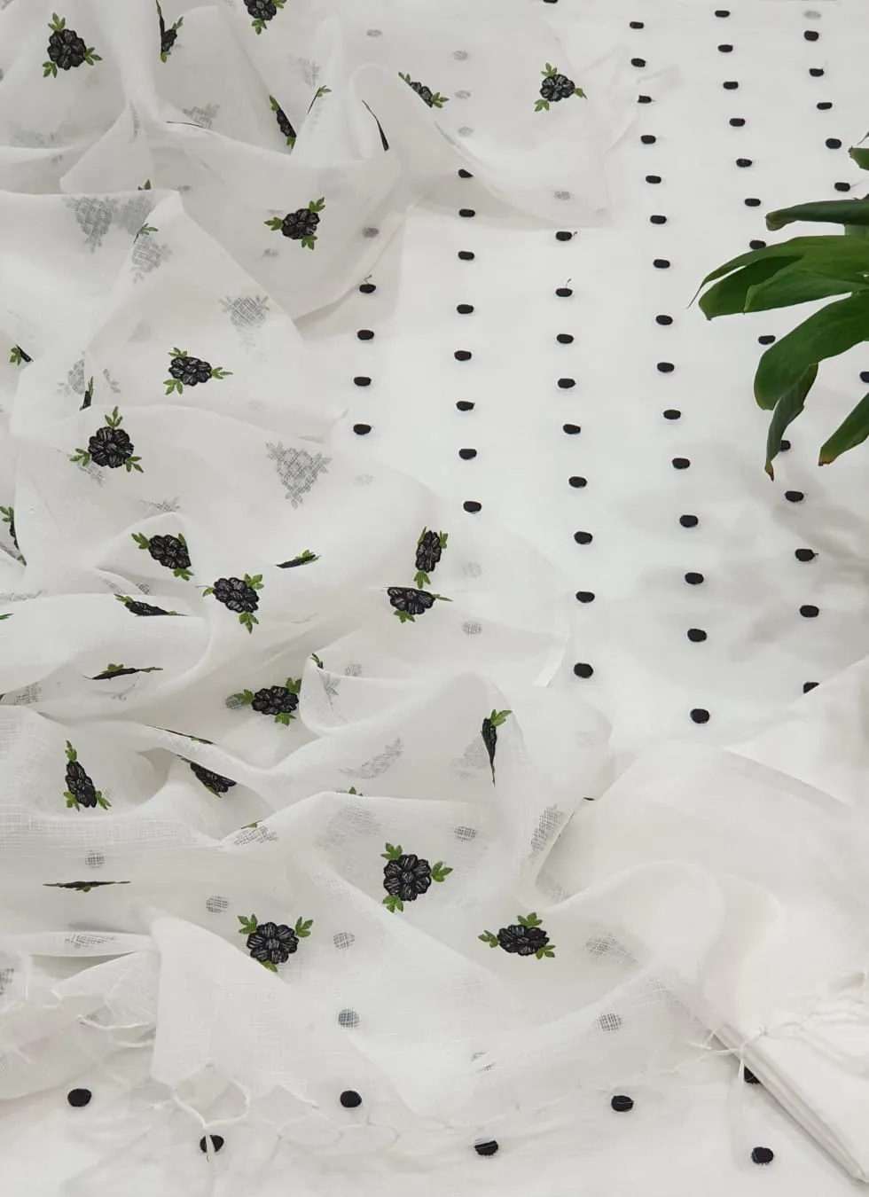 Kota Doriya Embroidery Work Suit In white Colour with green dotted touch