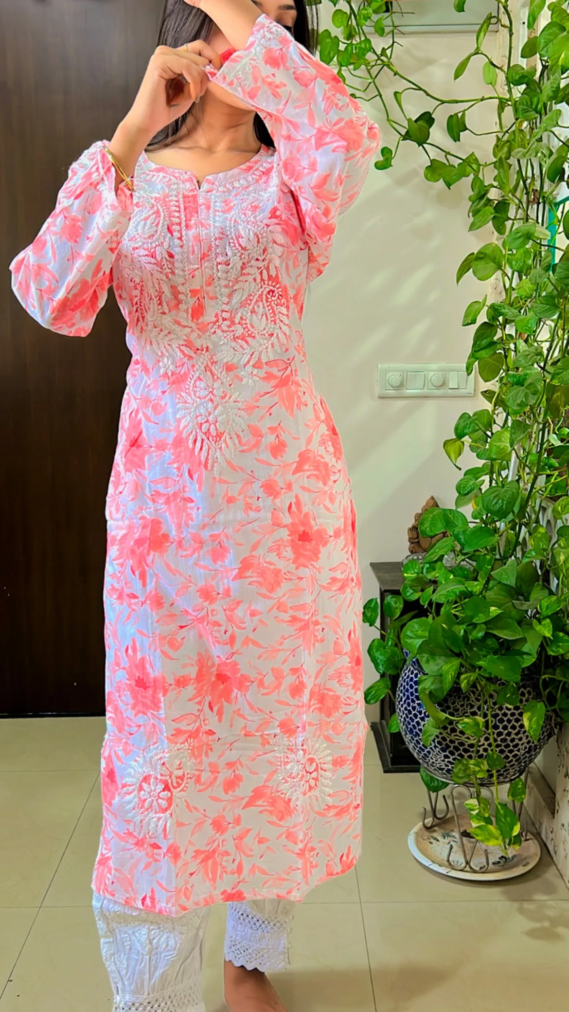 Mul mul cotton chikankari kurti in orange floral