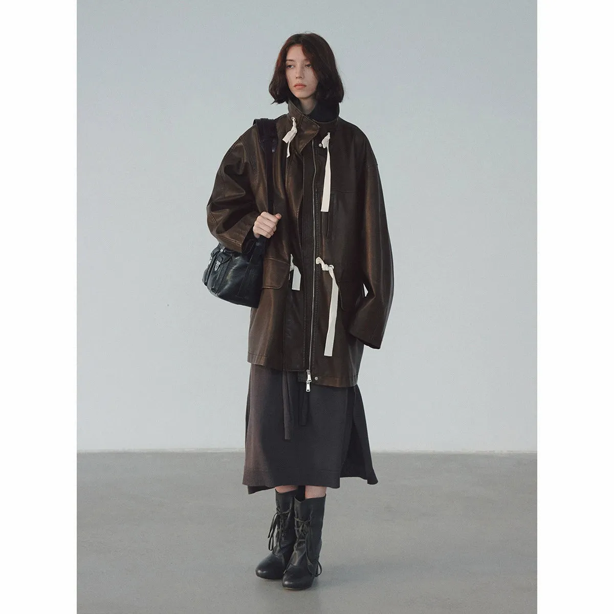 Oversized Faux Leather Jacket with Drawstring Accents