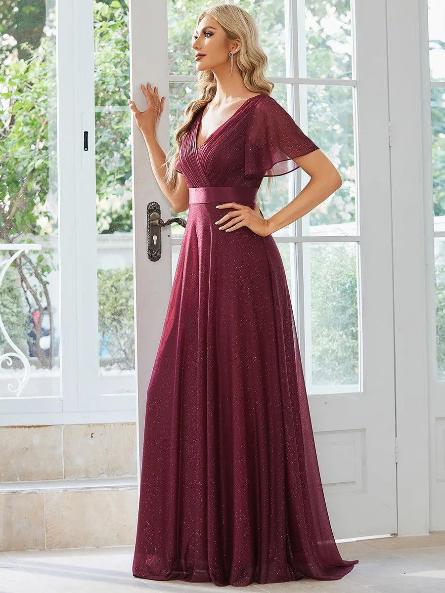 Robe de soirée longue scintillante à col en V et à manches flottantes