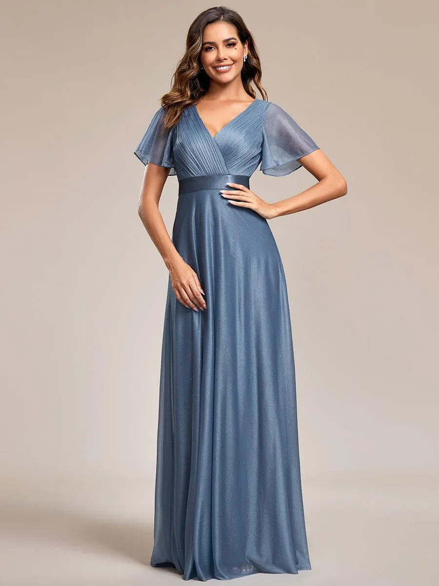 Robe de soirée longue scintillante à col en V et à manches flottantes