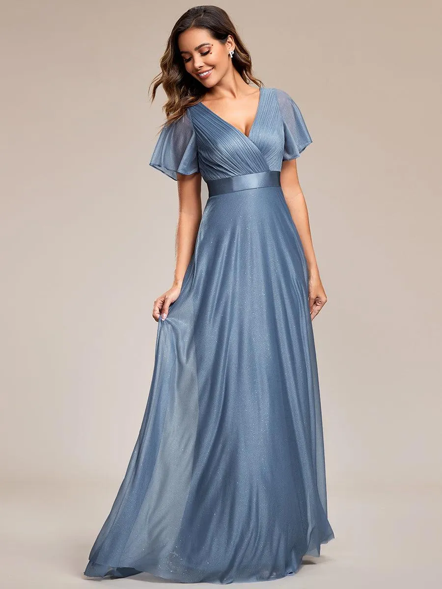 Robe de soirée longue scintillante à col en V et à manches flottantes