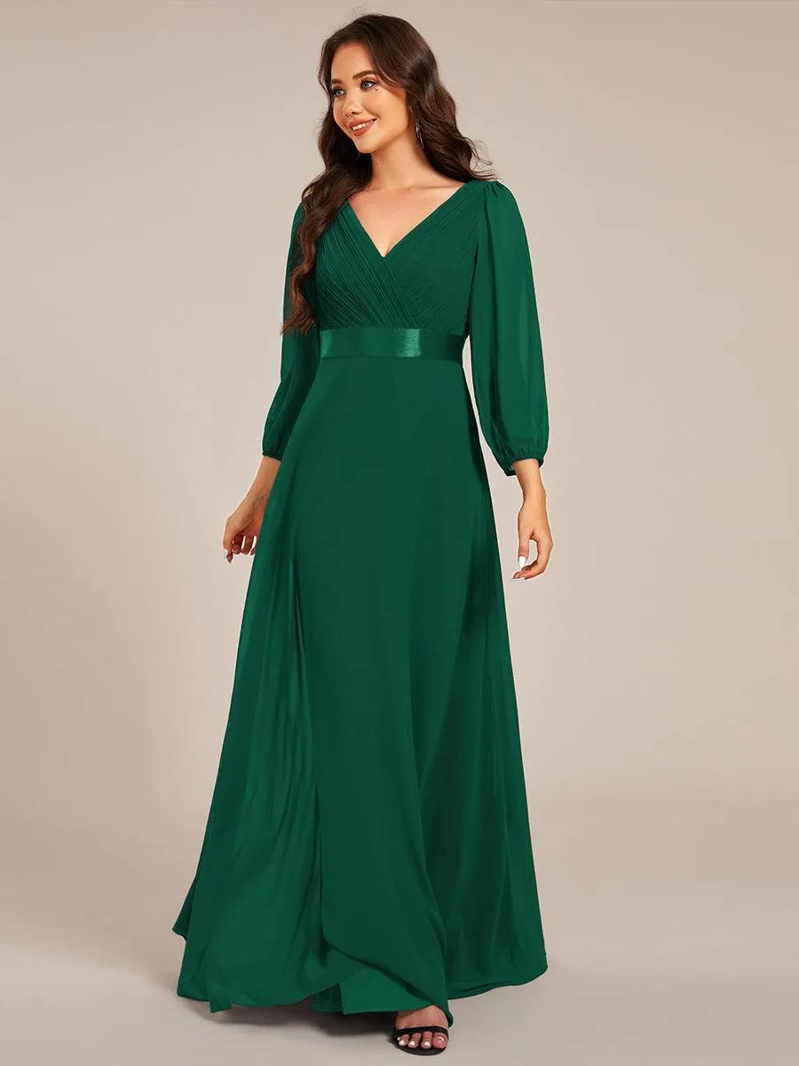 Robe de soirée trapèze taille empire en mousseline à manches longues