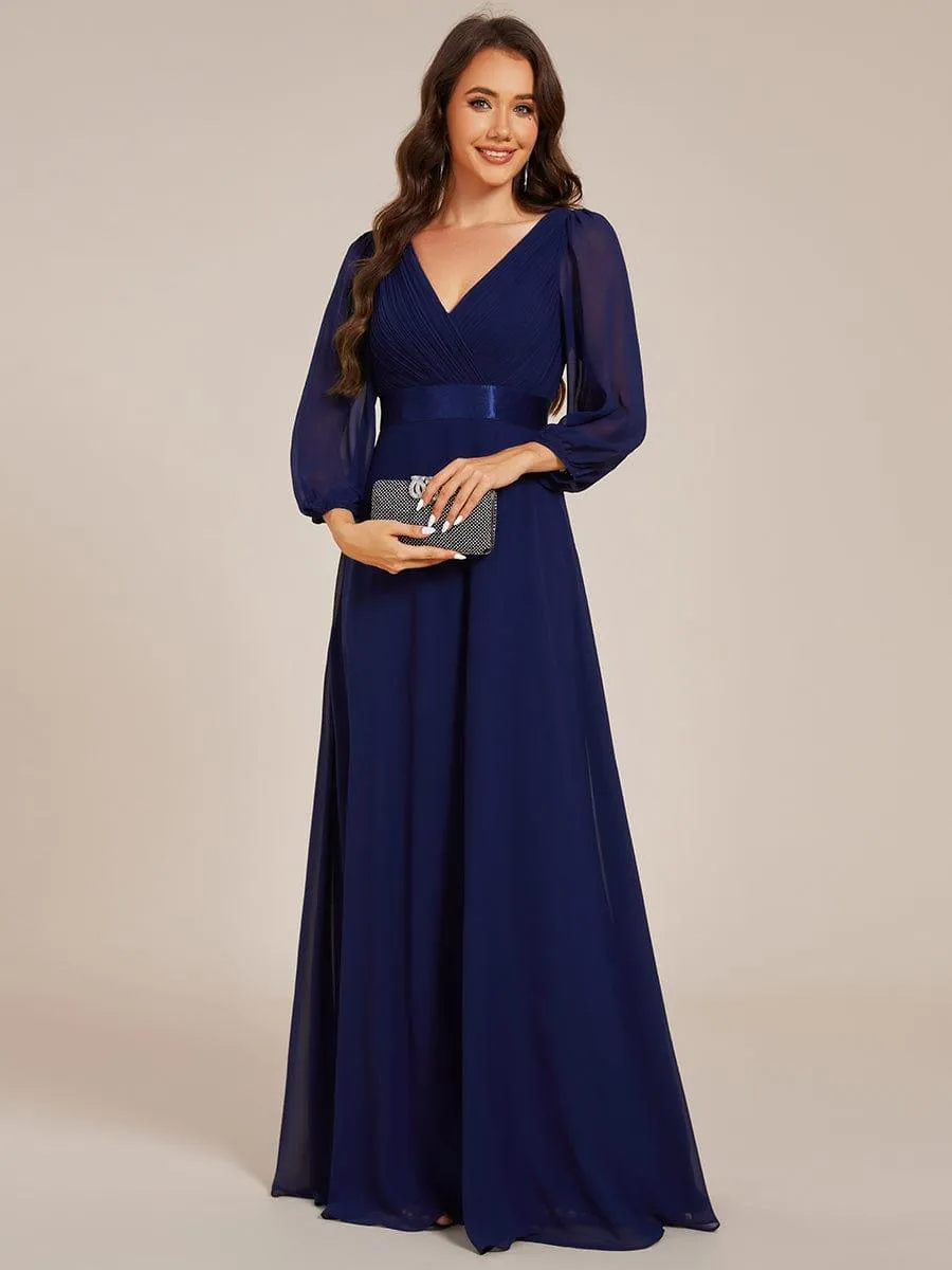 Robe de soirée trapèze taille empire en mousseline à manches longues