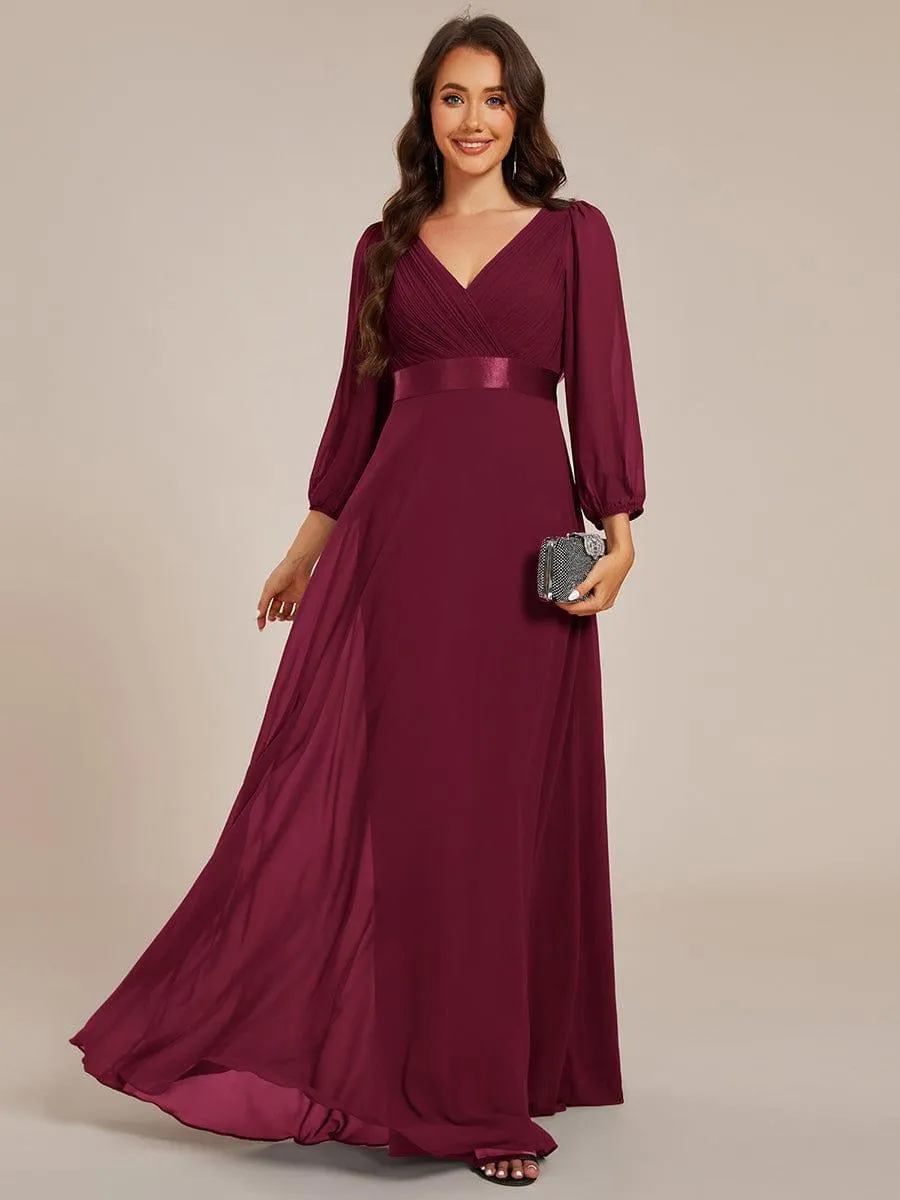 Robe de soirée trapèze taille empire en mousseline à manches longues