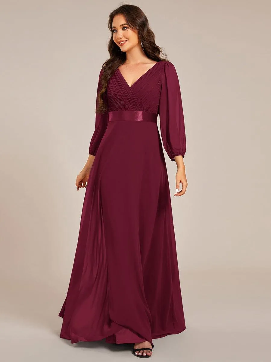 Robe de soirée trapèze taille empire en mousseline à manches longues
