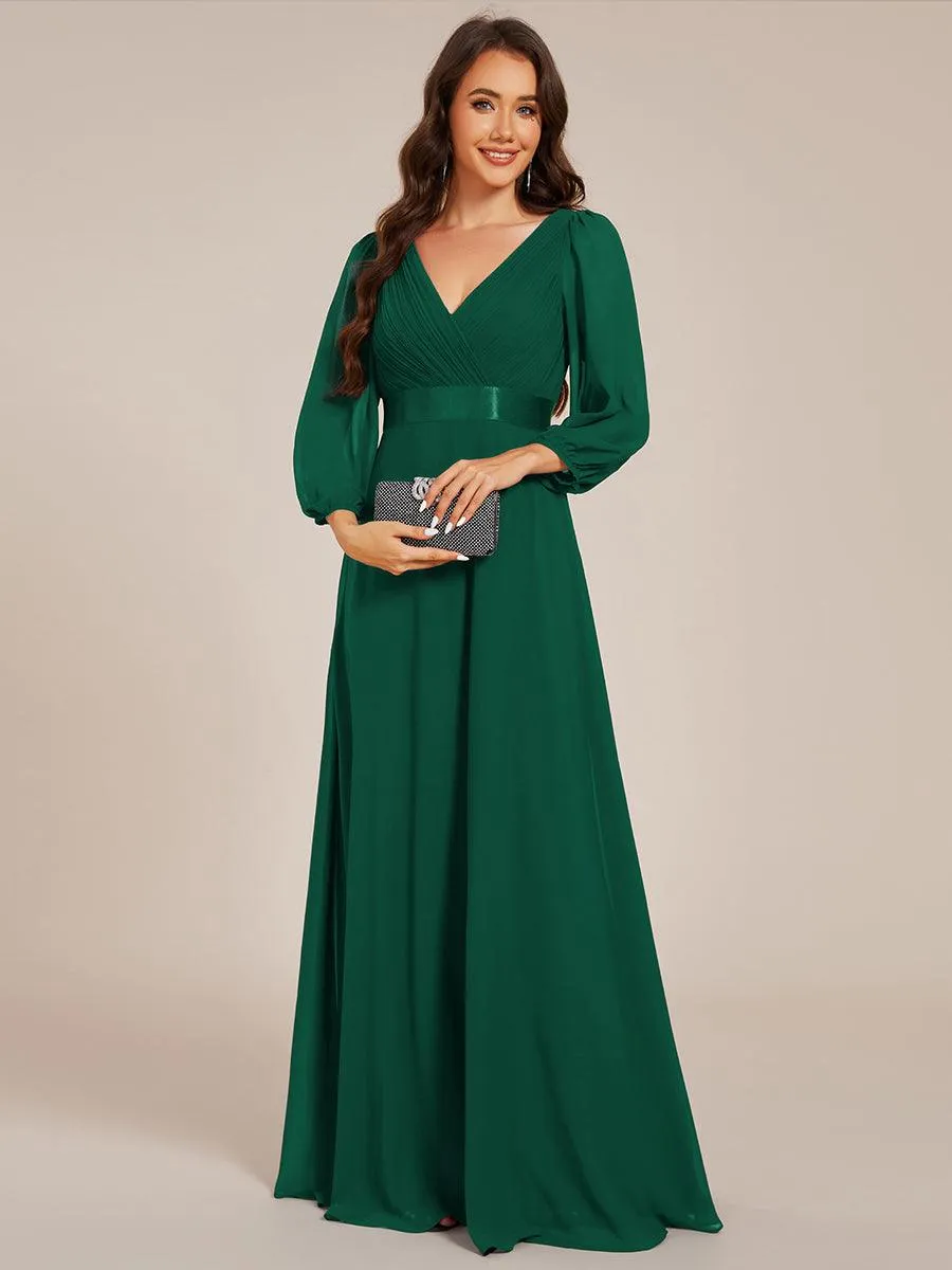 Robe de soirée trapèze taille empire en mousseline à manches longues