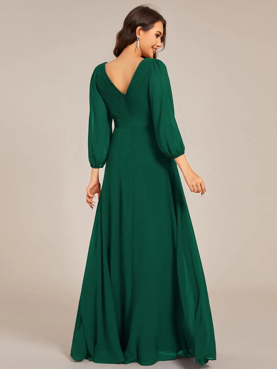 Robe de soirée trapèze taille empire en mousseline à manches longues
