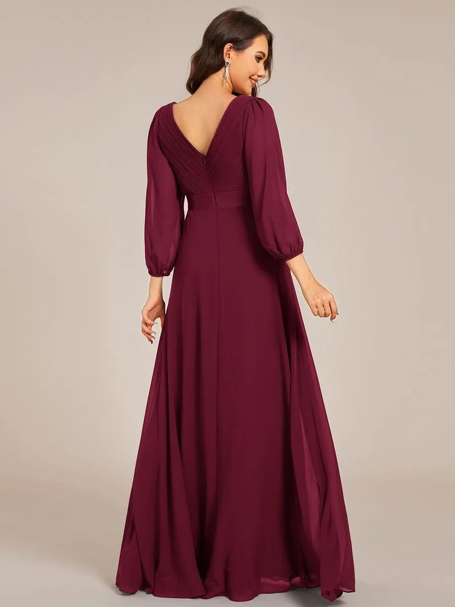 Robe de soirée trapèze taille empire en mousseline à manches longues